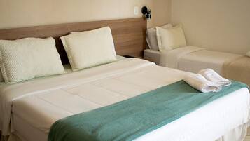 Suíte premium, vista para a cidade | 1 quarto, roupas de cama antialérgicas, frigobar