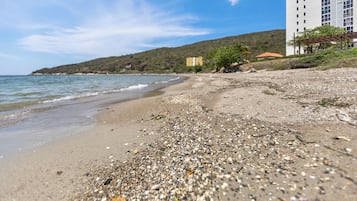 On the beach, sun loungers