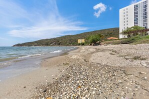 On the beach, sun loungers - A Pool, A Beach & A Beautiful Apartment - Book Now (Portmore)