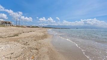 On the beach, sun loungers