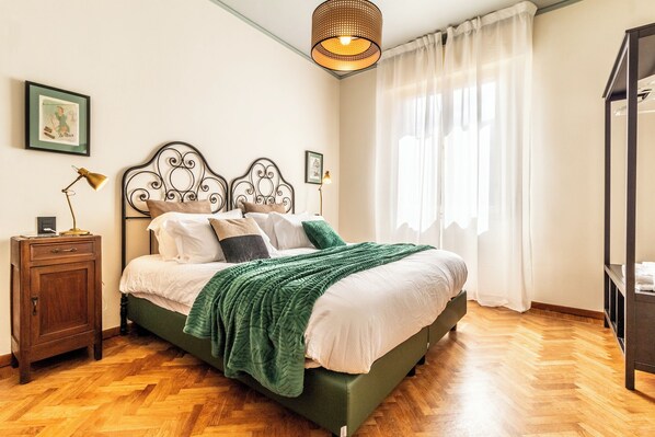 Departamento | 2 habitaciones, tabla de planchar con plancha, cunas y wifi gratis 