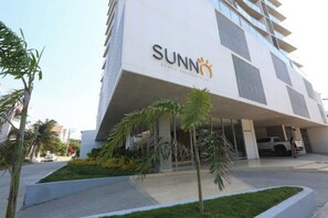 Experience the sleek architecture of SUNN, featuring a flat roof and spacious balconies.