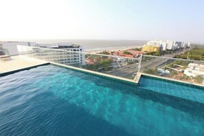 Enjoy a refreshing swim with a stunning view of the city and ocean from our rooftop pool.