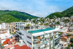 Enjoy panoramic views of the surrounding hills from the rooftop pool.