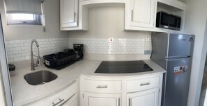 Fridge, microwave, stovetop, coffee/tea maker - City View Luxury Studio (Montego Bay)