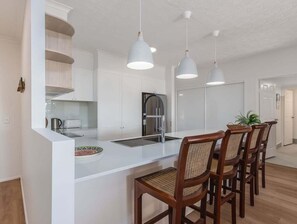 Fridge, microwave, oven, stovetop - Three Bedroom Oceanfront on Marine Parade (Tweed)