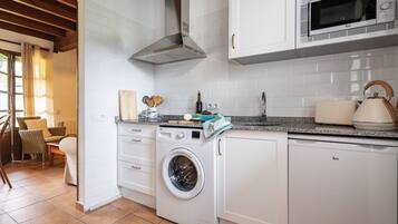 Fridge, microwave, cookware/dishes/utensils