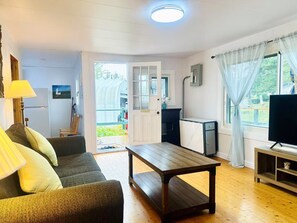 Maison Élite, vue jardin | Coin séjour