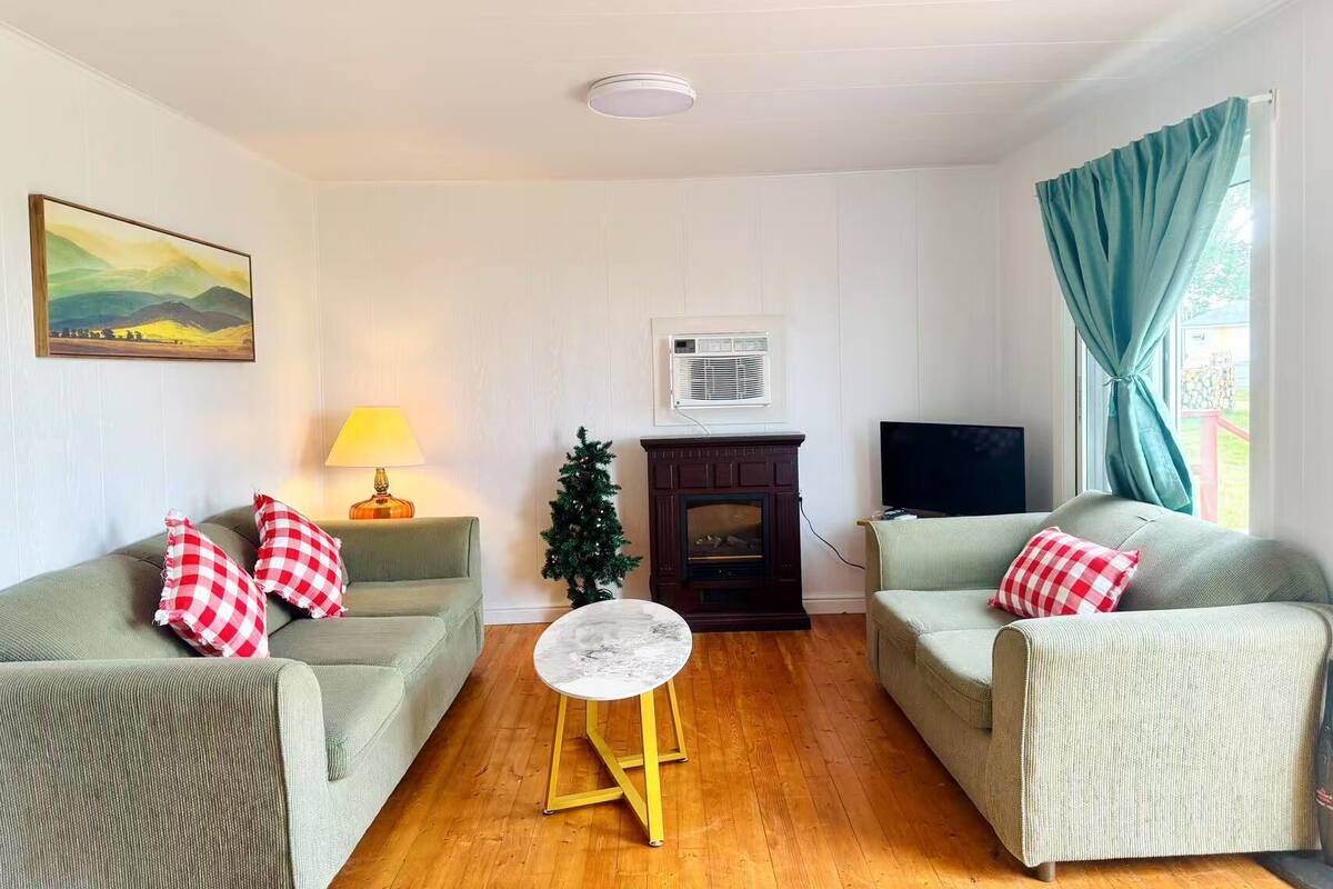 Comfort House, Garden View | Living area | 60-cm flat-screen TV with cable channels, fireplace, DVD player