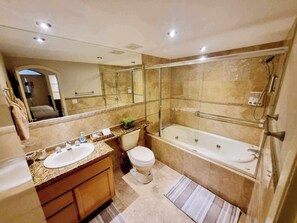 Shower, jetted bath, hair dryer, towels