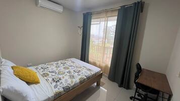 2 bedrooms, blackout curtains, iron/ironing board, free WiFi