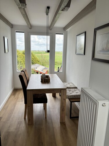 Ferienhaus 'Dinas Huus' mit privater Terrasse, privatem Garten und WLAN