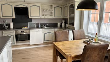 Fridge, microwave, dishwasher, coffee/tea maker