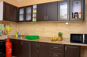 Deluxe Bungalow | Living area - Melloz Cozy Homes (Kampala)