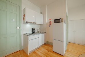 Fridge, microwave, coffee/tea maker, electric kettle