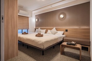 Familie suite, 2 slaapkamers, niet-roken | Woonruimte | Een 40-inch televisie met digitale zenders