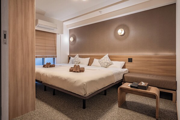 Suite familiar, 2 habitaciones, para no fumadores | Área de sala de estar | Televisión de 40 pulgadas con canales digitales 
