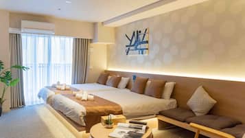 Deluxe Quadruple Room, 2 Queen Beds, Non Smoking | Soundproofing, free WiFi