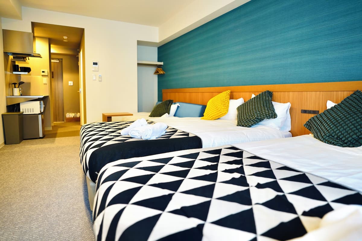 Suite, Beberapa Tempat Tidur, Bebas Asap Rokok | 1 kamar tidur, Wi-Fi gratis, dan seprai linen