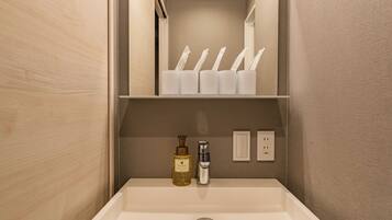 Shower, free toiletries, hair dryer, slippers
