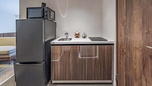 A compact kitchen with a refrigerator, a sink, and a countertop. - Apartment Hotel 11 Shinsaibashi 5 (Osaka)
