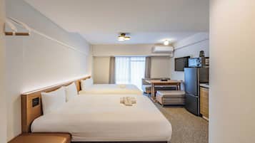 Standard Quadruple Room, 2 Queen Beds, Non Smoking | 2 bedrooms, free WiFi