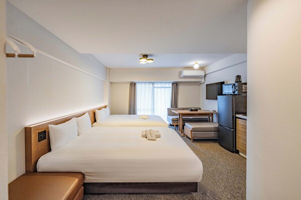 Standard Quadruple Room, 2 Queen Beds, Non Smoking | 2 bedrooms, free WiFi