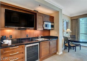 Fridge, microwave, stovetop, coffee/tea maker