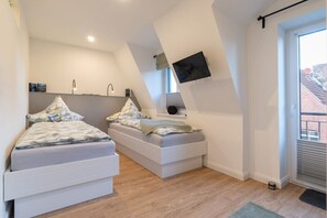 1 chambre, fer et planche à repasser, accès Internet, draps fournis