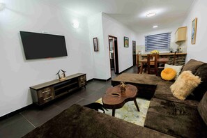 TV - Lucian Cottages: 3 bedroom peaceful retreat in Munyonyo (Kampala)
