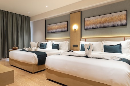 1 habitación, ropa de cama de alta calidad, cubrecamas y minibar