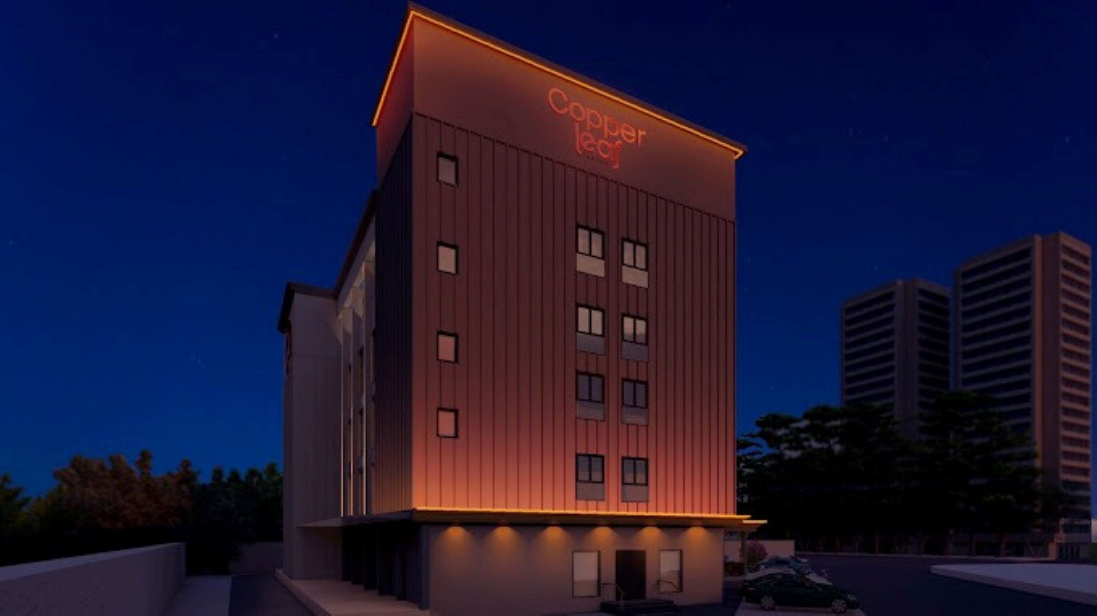 A modern hotel building with a flat roof, multiple windows, and a sign reading "Copper Leaf."