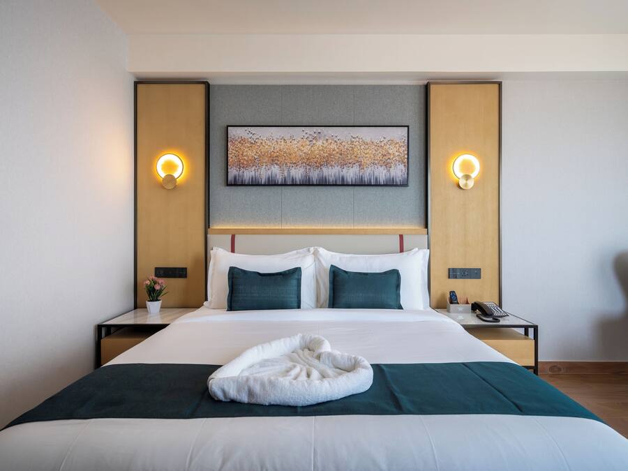 Habitación junior, 1 cama doble, no fumadores | 1 dormitorio, ropa de cama de alta calidad, edredones de plumas