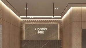 A reception desk with a marble top and a sign that reads "Copper Leaf Hotels". - Copper Leaf Hotels, Tirunelveli (Palayankottai)