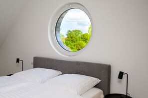 2 dormitorios, tabla de planchar con plancha, Internet y ropa de cama