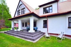 Holiday Home Exterior [summer] - Large holiday villa with fireplace and garden (Polanow)