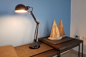 Work in comfort with a desk and ample workspace.