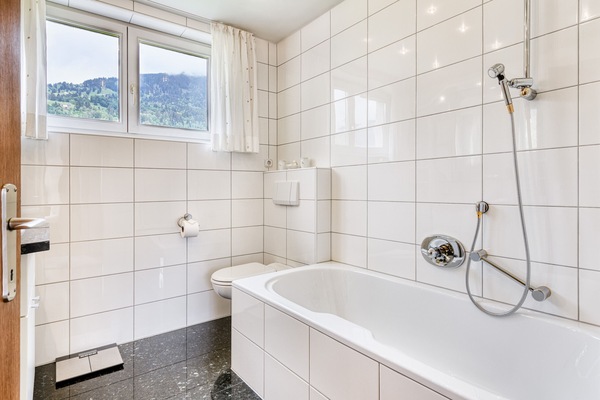 Bathroom with bathtub at Landhaus Bergblick in Ludesch in Walgau.