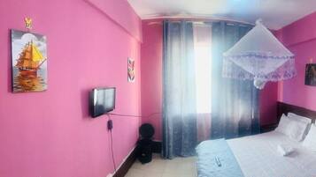 Blackout drapes, iron/ironing board, free WiFi