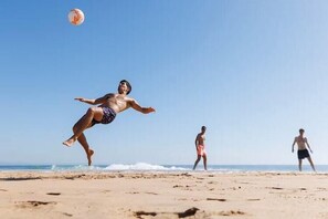 Guests can enjoy a lively beach scene with plenty of space to play.