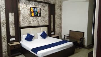 Deluxe Room, Balcony | In-room safe, desk, laptop workspace, rollaway beds