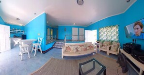 Villa, plusieurs lits, en front de plage | Coin séjour