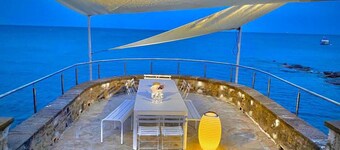 Double waterfront villa with private beach