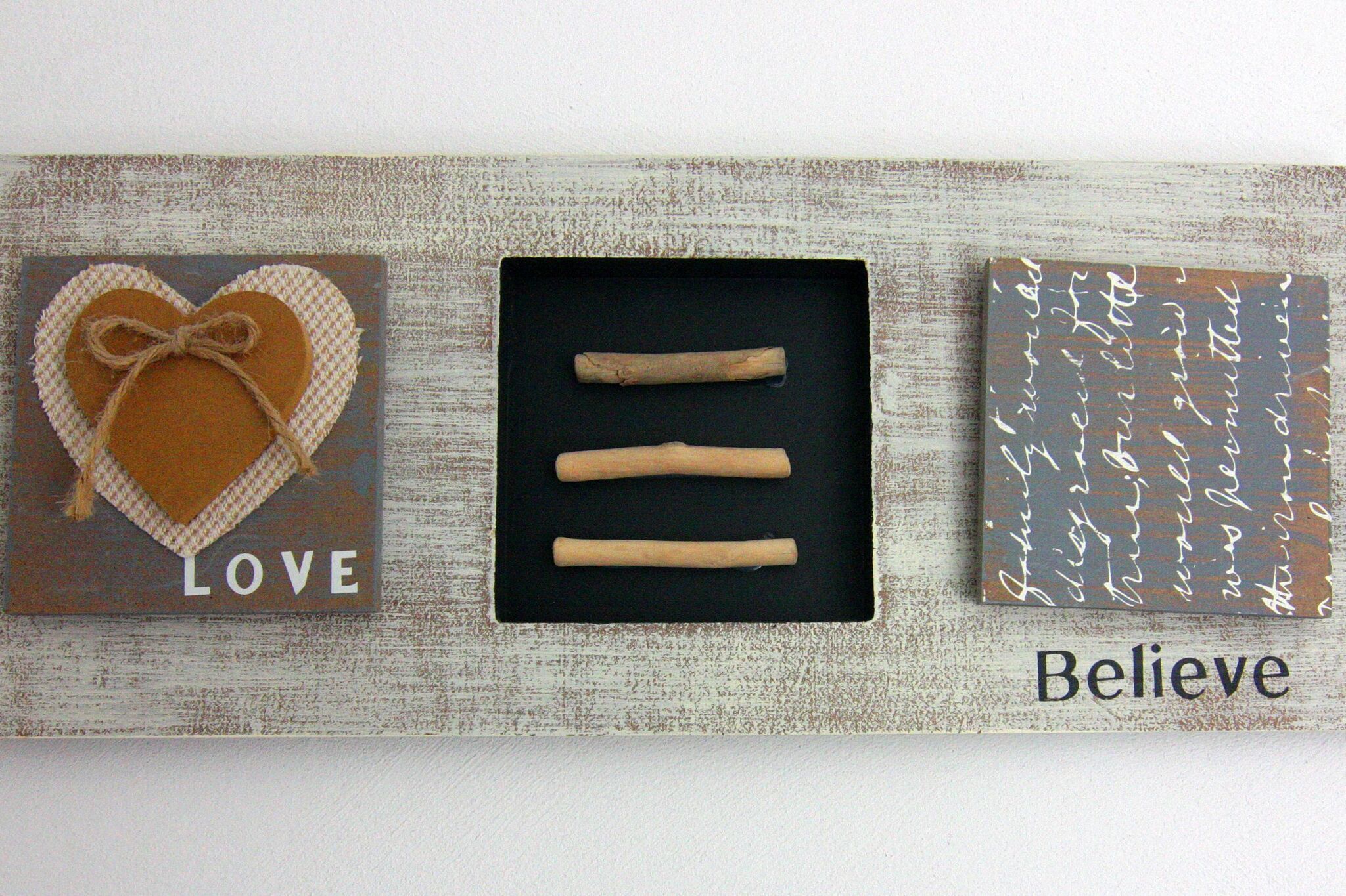 Three decorative panels with words and symbols.