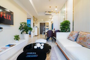 Deluxe Apartment, 2 Bedrooms, Kitchen, City View | Living area - 9TRIP STAY in Soho Residence (Ho Chi Minh City)