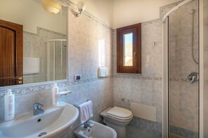 Apartment, 3 Bedrooms | Bathroom | Shower, hair dryer, bidet, towels - Terrazza Mandralisca by Wonderful Italy (Cefalù)