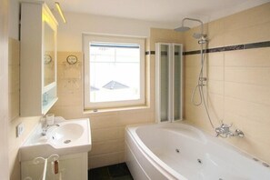 Shower, jetted bath, hair dryer