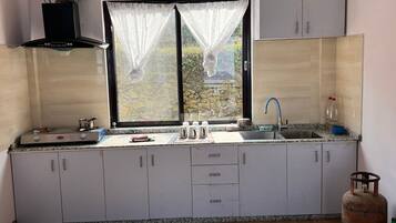 Electric kettle, eco-friendly cleaning products, paper towels