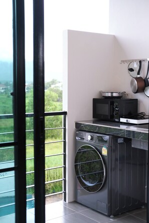 Deluxe Room, 1 Bedroom, Pool Access | Private kitchenette | Microwave, electric kettle - Alisse Stay Phuket Layan (Thep Krasattri)