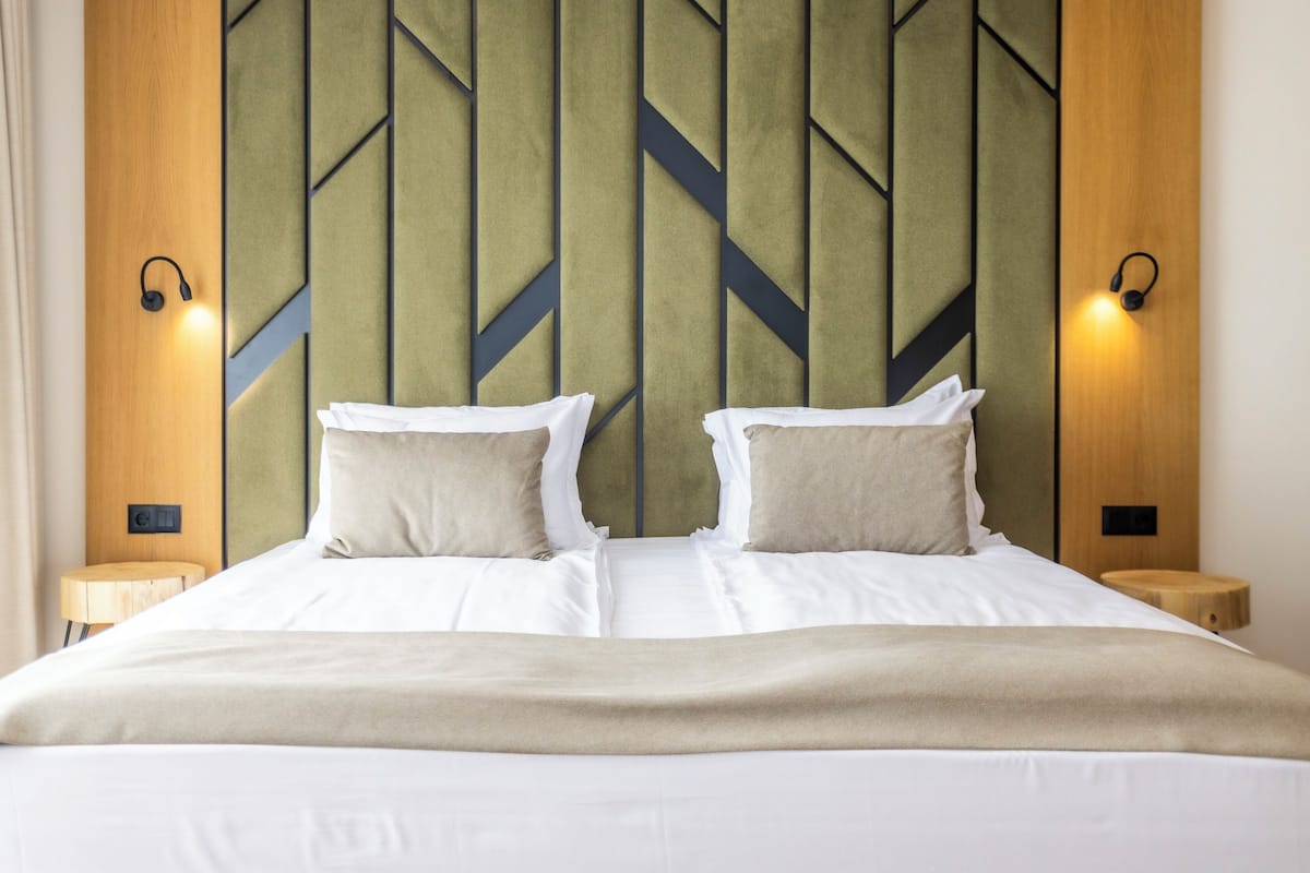 Classic Suite, Balcony, Pool View | In-room safe, laptop workspace, blackout curtains